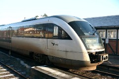 DSB Desiro MQ trainset photographed at the railway station in Svendborg 31. December 2003. The MQ class is built by Siemens in Germany. DSB has leased 12 units primarily for the line Odense - Svendborg. The type is used widely in Germany. The trainsets were put in service in Denmark in 2002. Two diesel engines of 315 kW per trainset. Max speed 120 km/h - 75 mph. Length 41 700 mm. Weight 68,2 metric tonnes. 114 seats 2nd class. Up to 3 trainsets can be put together.